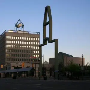 A large building with a clock on top of it. A large building with a clock on top of it.