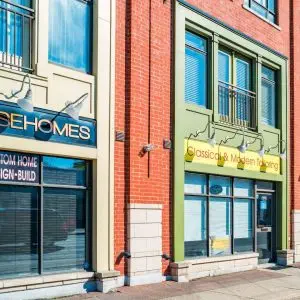 A brick building with a sign on it. A brick building with a sign on it.