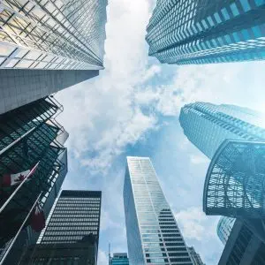 Looking up at skyscrapers in a city. Looking up at skyscrapers in a city.