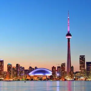 Toronto skyline at dusk with the cn tower in the background. Toronto skyline at dusk with the cn tower in the background.